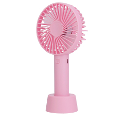Rear studio view of the pink rechargeable handheld fan showing the back grille design and charging indicator slot.