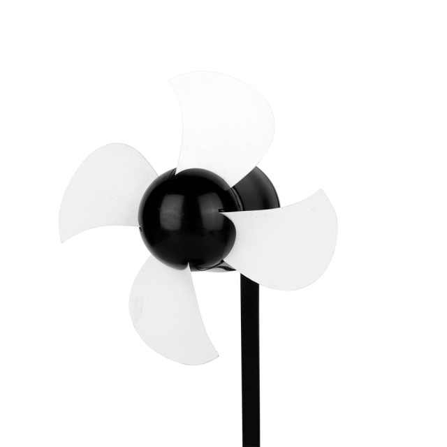 Close-up studio view of the 4-blade white soft rubber fan blades attached to the black motor head assembly.