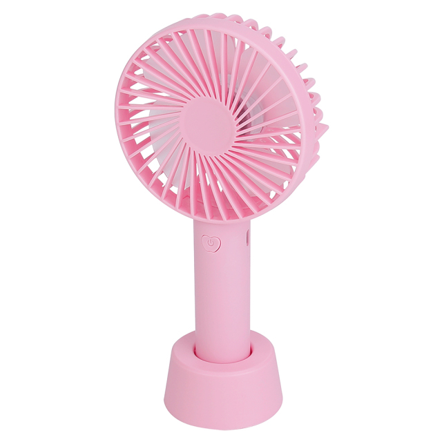 Angled front studio view of the pink vertical desktop mini fan secured inside its removable standing dock.