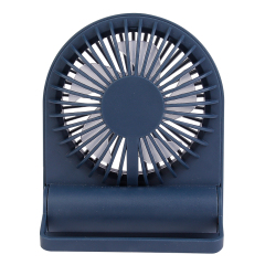 Front studio view of the navy blue personal fan completely folded flat for ultra-portable pocket carrying.