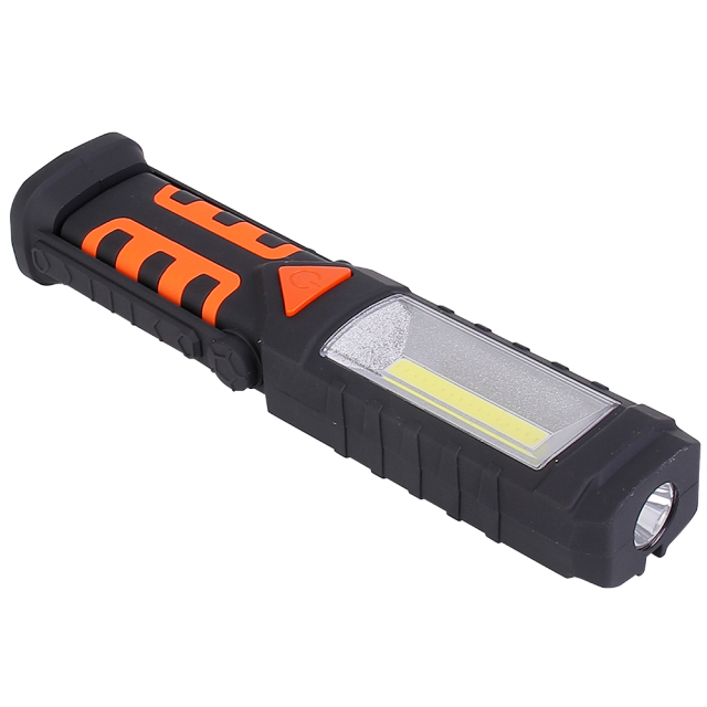 The handheld LED work light laid flat on its side, showing its top torch and main COB light features.
