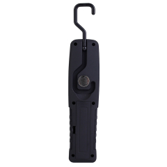 Close-up view of the magnetic LED work light highlighting the bright yellow COB lighting strip and the red silicone power button.