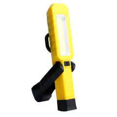 Side view of the portable LED work light with its integrated black stand unfolded at a 180-degree angle.