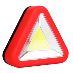 Three-quarter angled front view of the triangle emergency LED work light showcasing the central COB light panel.
