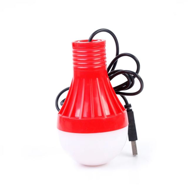 Vertical full view of the red bulb-shaped LED camping lantern with its black USB power cable on a plain white background.