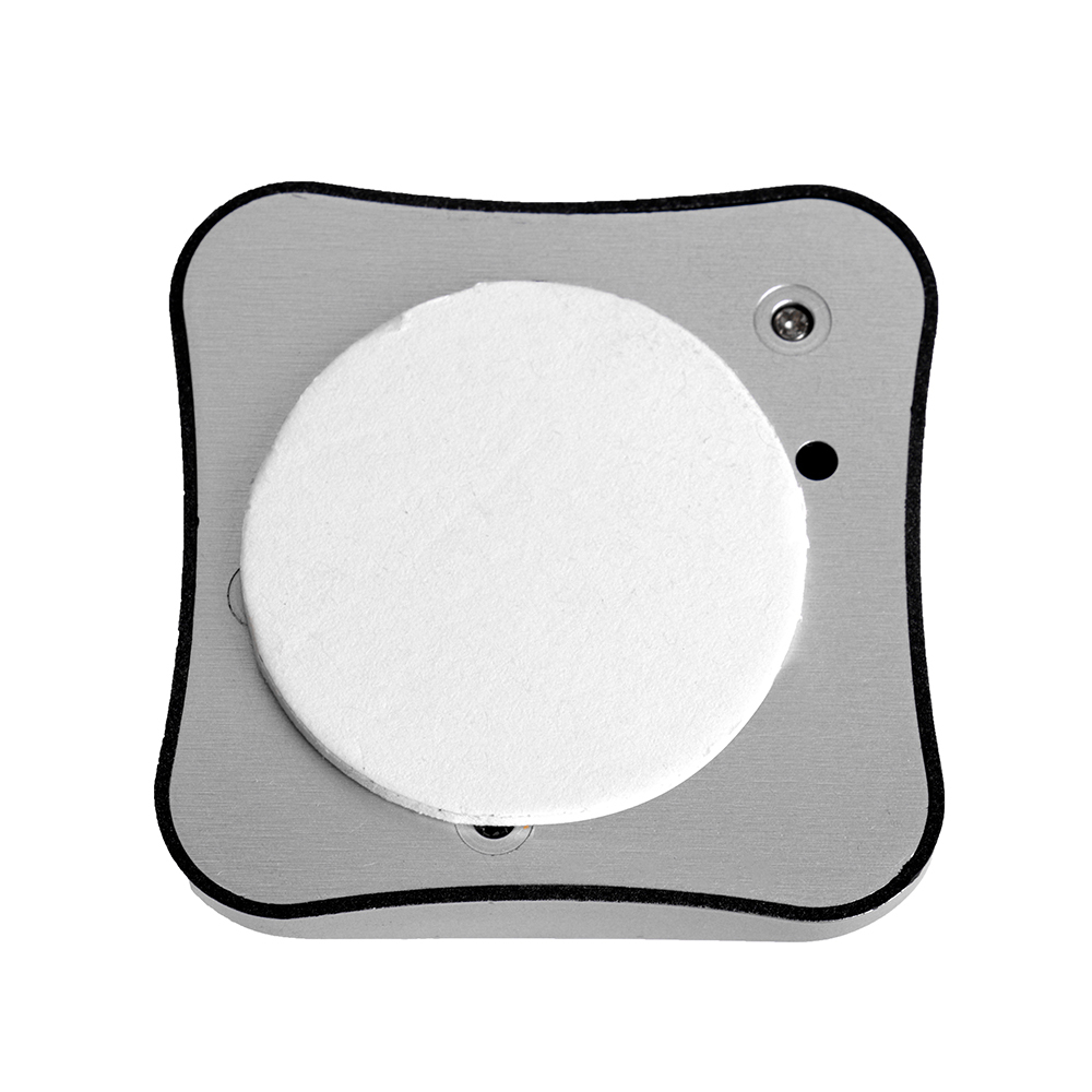 Back view of the metallic square mounting base, showing a central circular white adhesive pad.