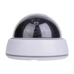 Front horizontal view of the dummy dome camera featuring a white ABS base and a clear dark plastic dome housing a simulated lens on a white background.