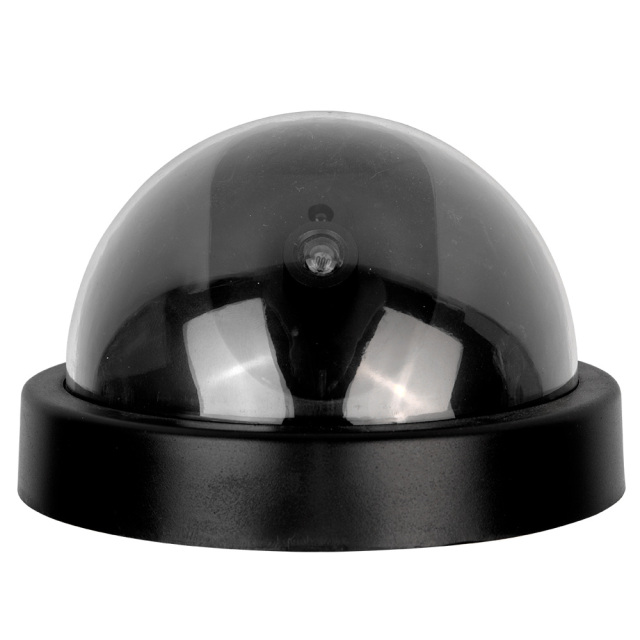 Front horizontal view of the compact black dummy dome camera showcasing its smooth curved transparent dark dome shield on a white background.