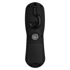 Back panel view of the black plastic work light showing a folded plastic hook and a circular magnetic base in the center, on a white background.