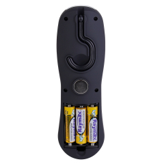 Rear view of the black light housing with the battery cover removed, displaying three yellow AA batteries loaded inside the compartment.