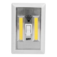 Front studio view of the white cordless wall switch light featuring dual vertical COB LED light bars and a central rocker switch on a clean white background.