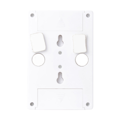 Rear view of the white switch light housing, showing the dual mounting setup with two circular magnets, two velcro pads, and integrated keyhole slots.