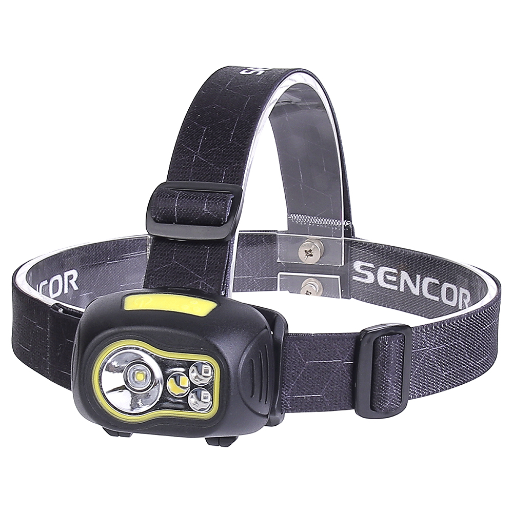 A three-quarter studio view of the head torch showing the curved shape of the black plastic housing, light green accents around the lenses, and the adjustable top-strap configuration.