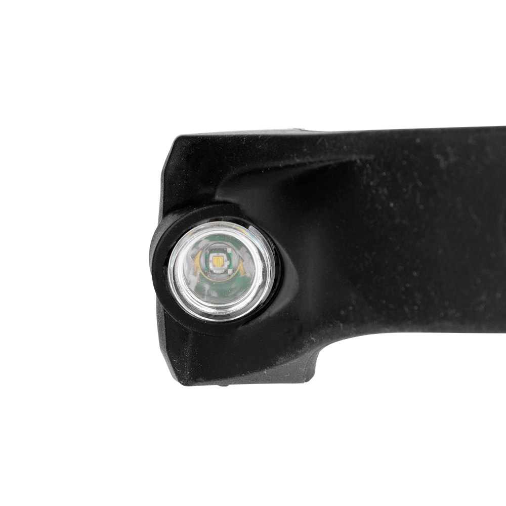 Studio detailed close-up showing the interface between the smooth black silicone body, the round XPE spotlight lens, and the start of the yellow COB LED strip.
