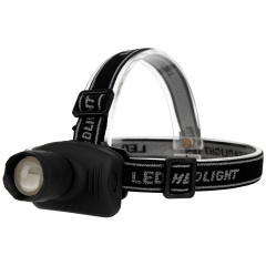 Studio three-quarter view of the lightweight black LED head torch, showcasing the cylindrical shape of the adjustable lens housing and the forehead mounting bracket.