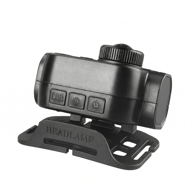 Studio top-angled view of the headlamp module detached or pivoted on its plastic mounting bracket, detailing the row of push buttons on the top housing and a cylindrical side knob.