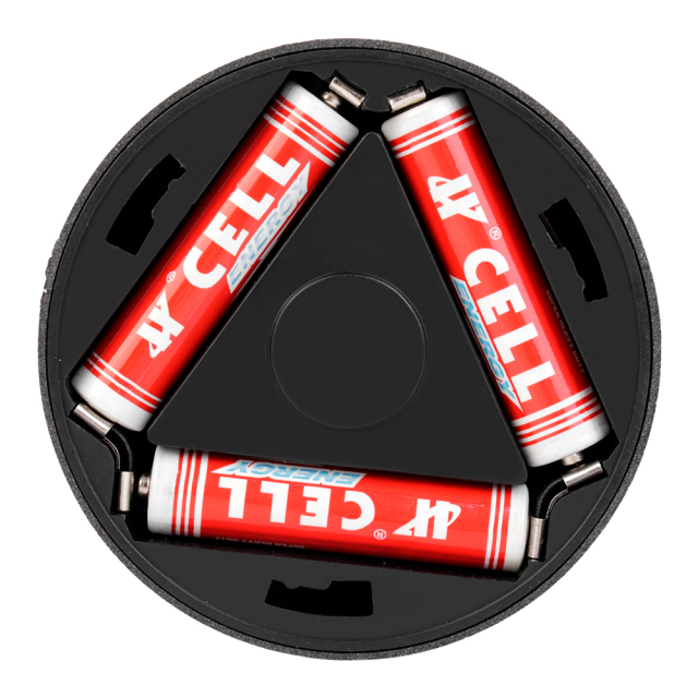 Studio view of the open battery compartment inside the back of the closet light, showing three AAA batteries installed in a triangular layout.