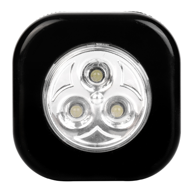 Studio front view of a black rounded-square wireless puck light featuring three integrated LEDs in a circular reflective center.