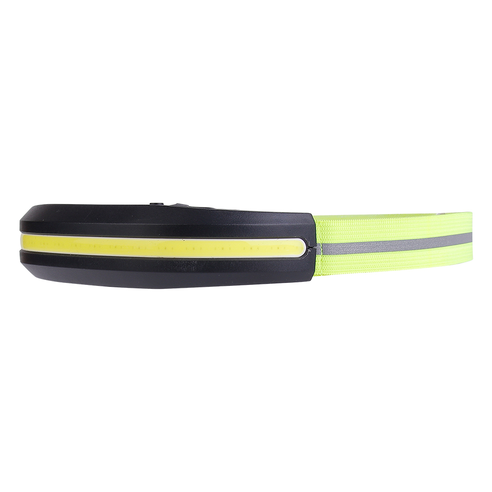 Studio three-quarter perspective view of the lightweight headlamp, showing the streamlined profile of the black front housing and the gray reflective safety line running along the center of the lime green band.