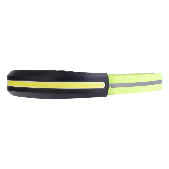Studio three-quarter perspective view of the lightweight headlamp, showing the streamlined profile of the black front housing and the gray reflective safety line running along the center of the lime green band.