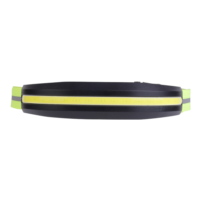 Studio front view of the curved black COB light module on a white background, highlighting the wide, continuous horizontal yellow LED lighting strip and the lime green elastic strap.