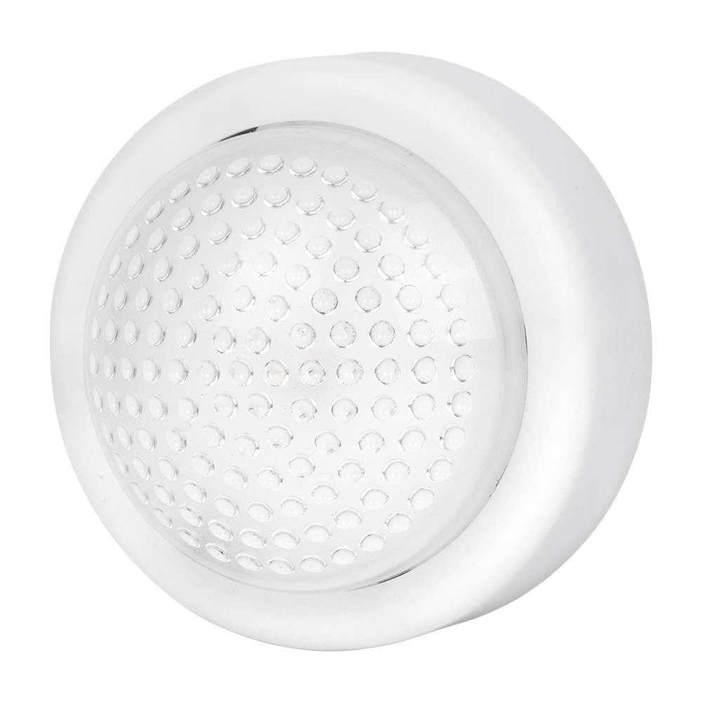 Studio angled view of the white round wireless dome LED puck light, showcasing the textured surface of the circular translucent cover.