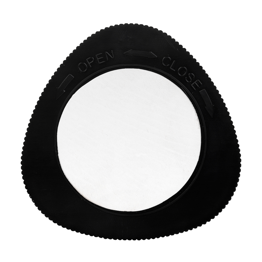 Studio view of the triangular black back cover of the cabinet light, showing the open and close directional markings for the twist base.