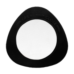 Studio view of the triangular black back cover of the cabinet light, showing the open and close directional markings for the twist base.