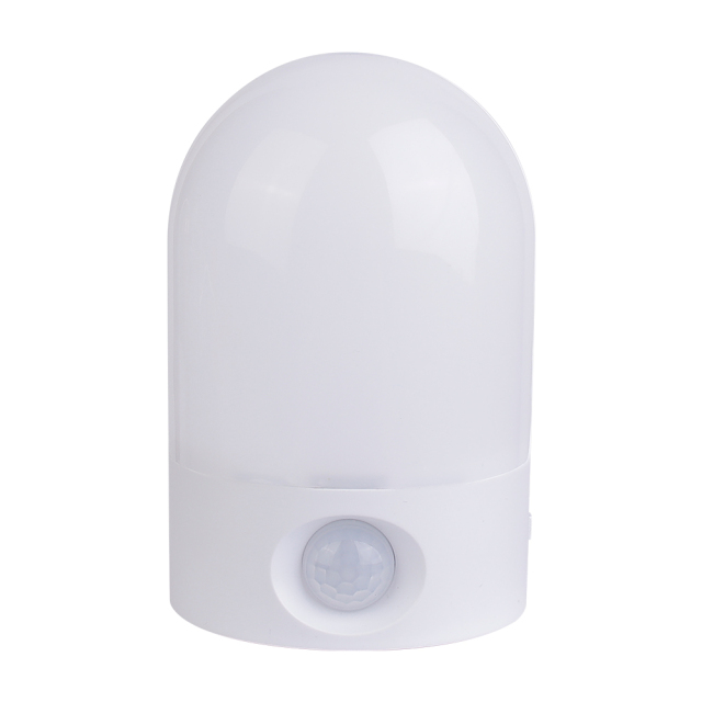 Studio front view of the white arched wireless LED night light, showing the frosted dome cover and the circular PIR motion sensor at the bottom.