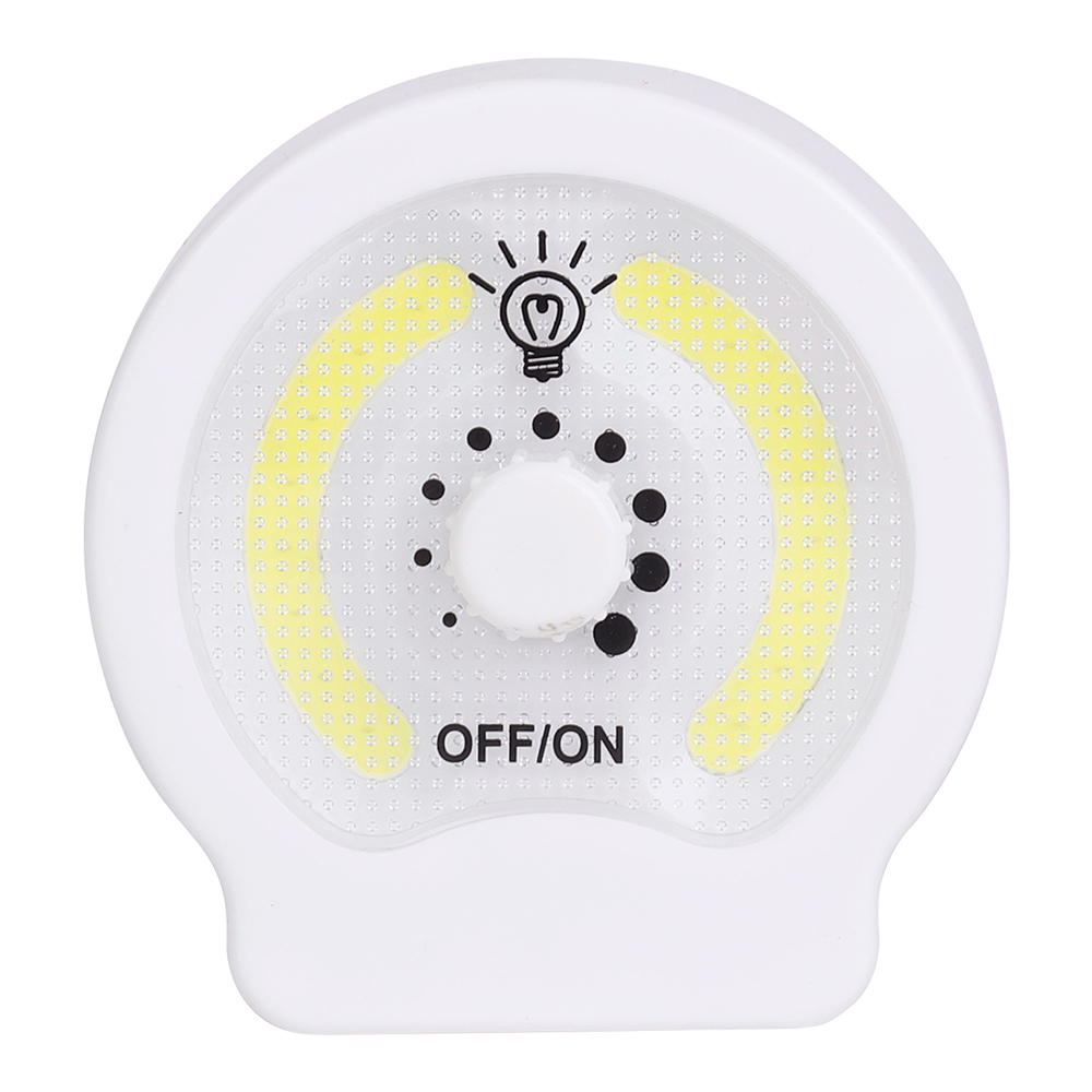 Studio front view of the circular dual COB LED night light, featuring a central rotary dimmer knob with dots for brightness adjustment and OFF/ON labels.