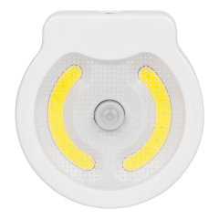 Studio front view of the circular dual COB LED motion sensor light, featuring two yellow curved COB light panels and a central PIR sensor.