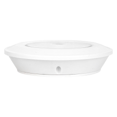 Studio side profile view of the white circular wireless LED puck light, displaying its slim profile and smooth plastic housing.