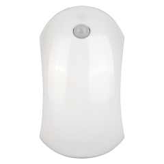Studio front view of a white curved wireless motion sensor light on a white background, showing its smooth crescent-shaped body and a circular sensor near the top.