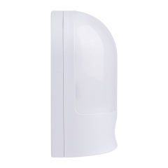 Studio right side profile view of the white arched wireless LED wall light, displaying the smooth plastic casing.
