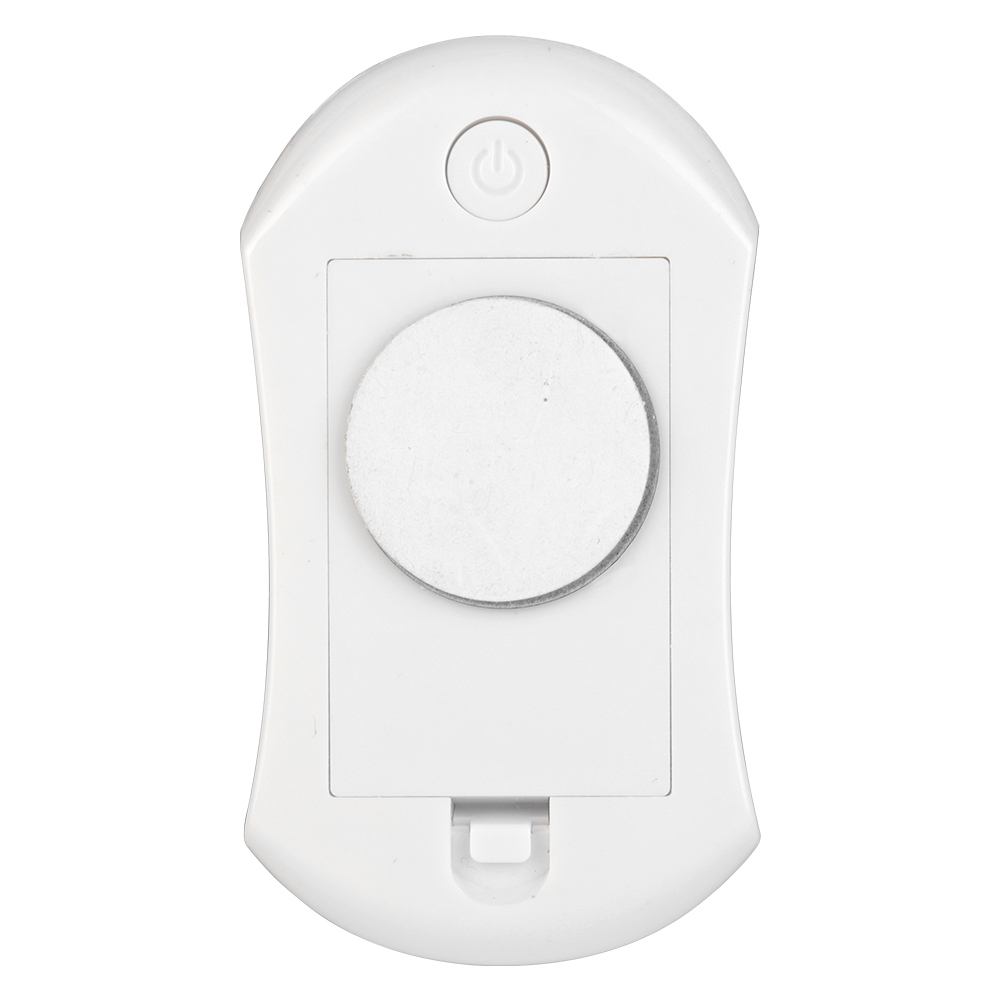 Studio view of the back cover of the white night light, featuring a prominent central circular magnet for surface mounting.