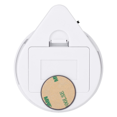 Studio view of the back of the teardrop base, showing a circular adhesive mounting pad and a flip-out integration plastic hook.