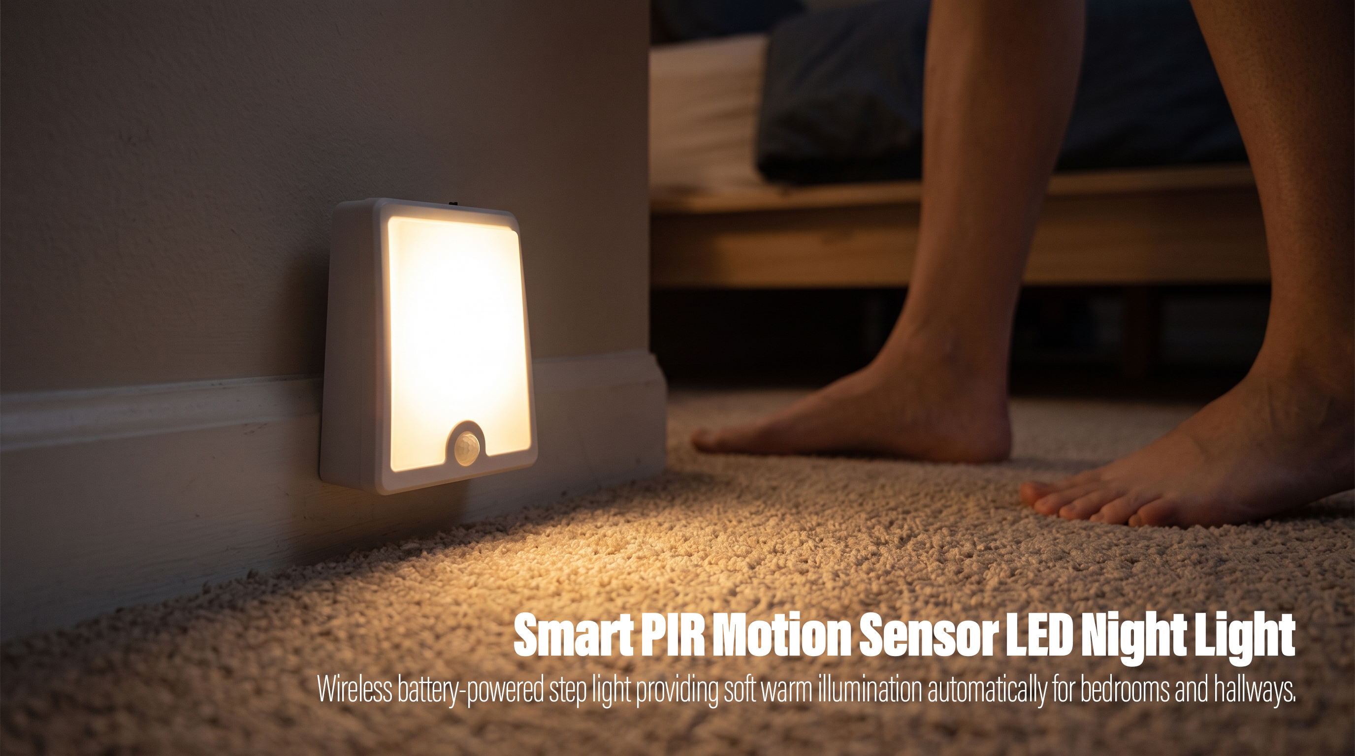 An illuminated white square PIR motion sensor LED night light mounted near the floor on a bedroom wall, casting a warm glow onto the carpeted floor as a person steps out of bed in the background.