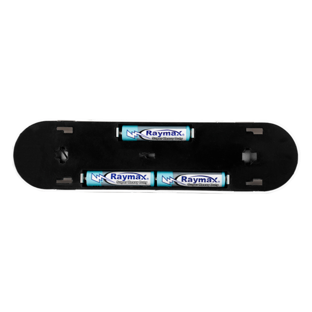 Studio view of the open internal battery compartment on the back of the black base, showing three AAA batteries installed inside the slim housing.