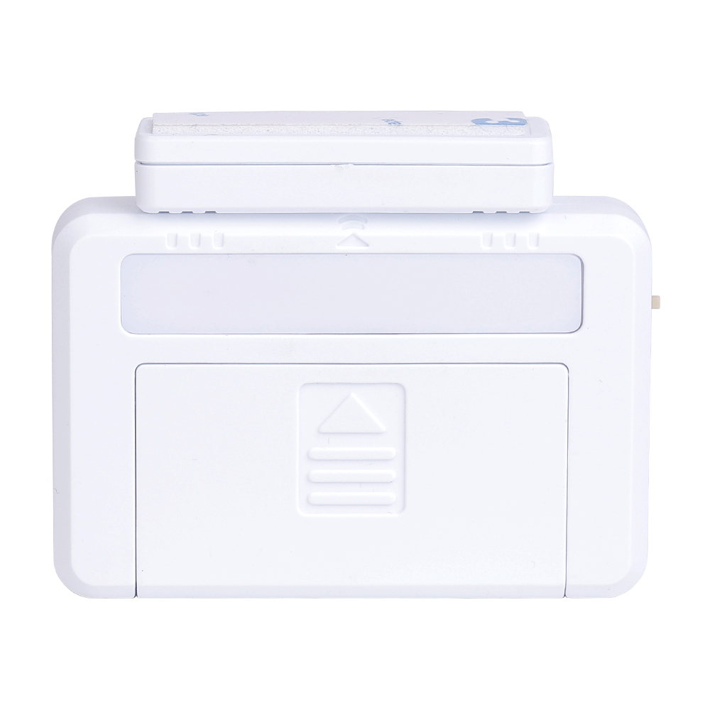 Front view of the white magnetic drawer light with the small contact sensor block placed closely on top.