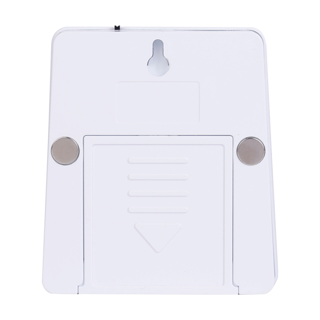 Studio back view of the white night light, showing a built-in keyhole slot for hanging, two round magnets on the sides, and a sliding battery cover.