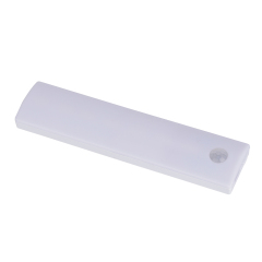 Studio angled view of the shorter white rechargeable LED cabinet light bar, showcasing its clean lines and rounded corner sensor.