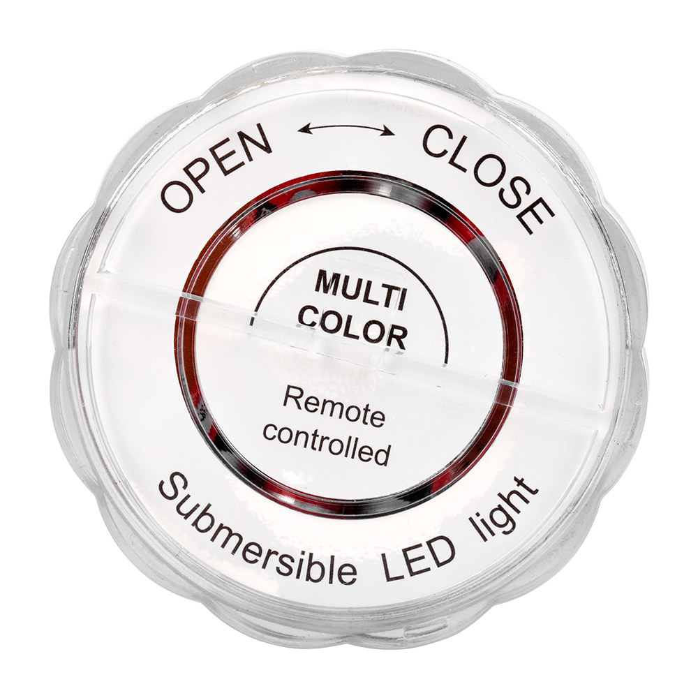 Studio back view of the round submersible LED light casing, featuring printed directional open and close text and arrows for the twist-lock mechanism.