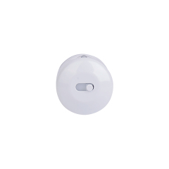 Close-up end cap view of the circular white closet light bar, showcasing the small sliding toggle switch for mode selection.