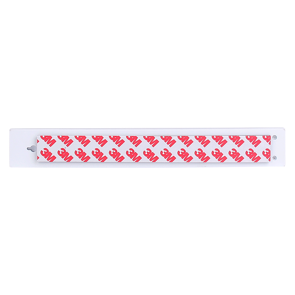 The back view of the long mounting plate displaying the red 3M adhesive sticker backing for easy peel-and-stick installation.
