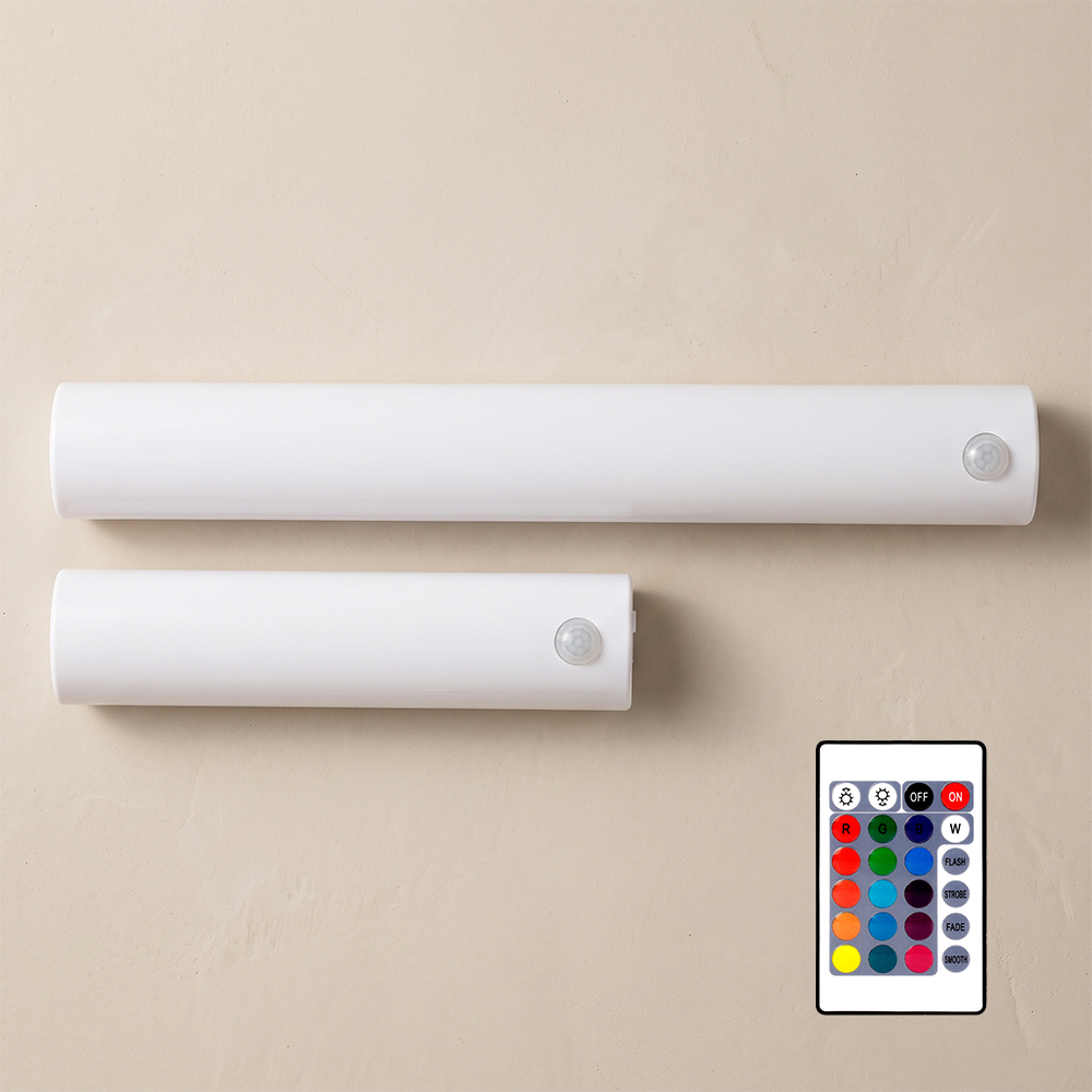 Two white rechargeable PIR motion sensor LED light bars in long and short sizes displayed alongside a multi-button RGB remote control.