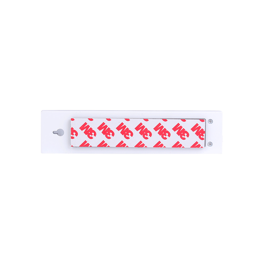 The back view of the short mounting plate showing the red 3M adhesive peel-off backing for cordless surface mounting.
