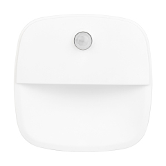 Front studio view of the white square battery-powered PIR motion sensor night light, showing its dome lens and downward diffuser.