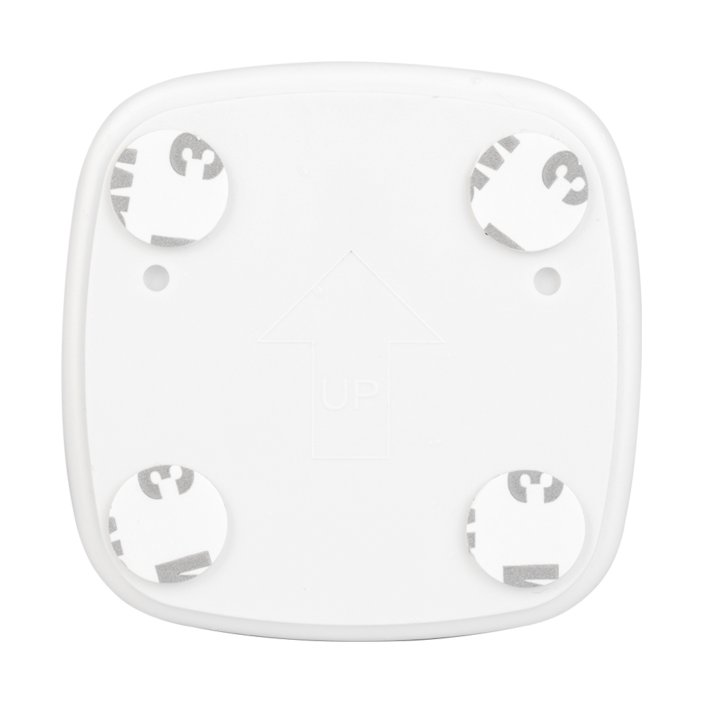 Back view of the square motion sensor night light, displaying four pre-applied circular magic tapes or adhesive stickers for mounting.