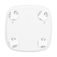 Back view of the square motion sensor night light, displaying four pre-applied circular magic tapes or adhesive stickers for mounting.