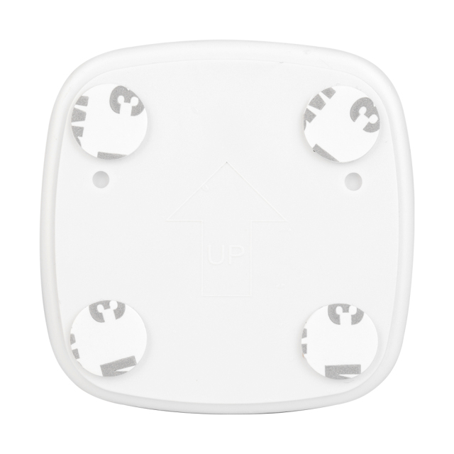 Back view of the square motion sensor night light, displaying four pre-applied circular magic tapes or adhesive stickers for mounting.